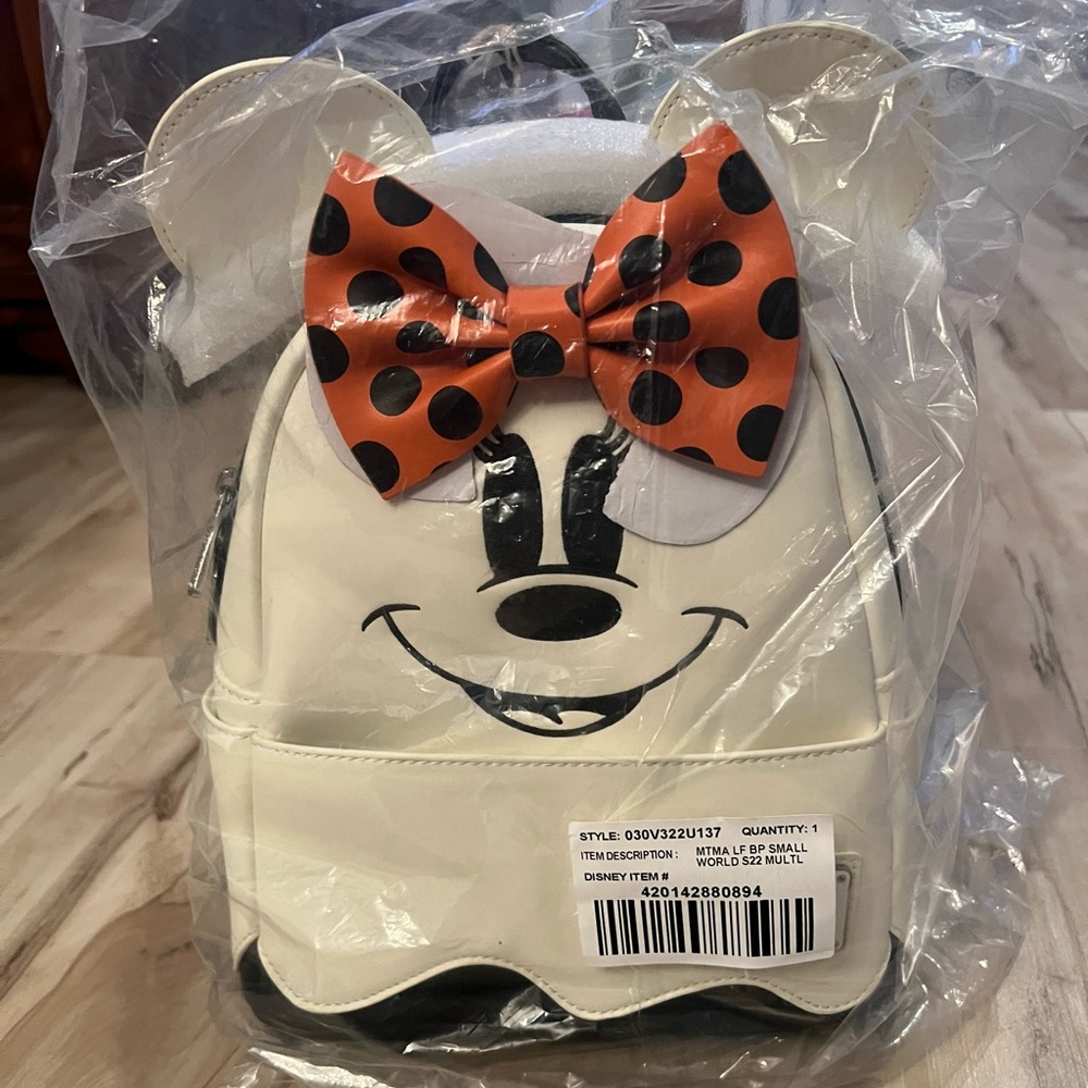 Minnie Mouse glow in the dark Loungefly mini backpack